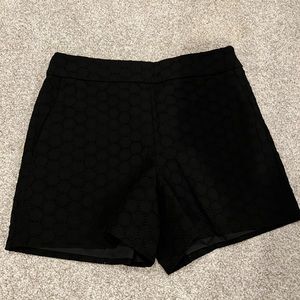 NWT. Black side zip short with detailed pattern.